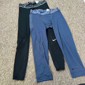 2 pairs Nike Pro men sz Small one black one grey